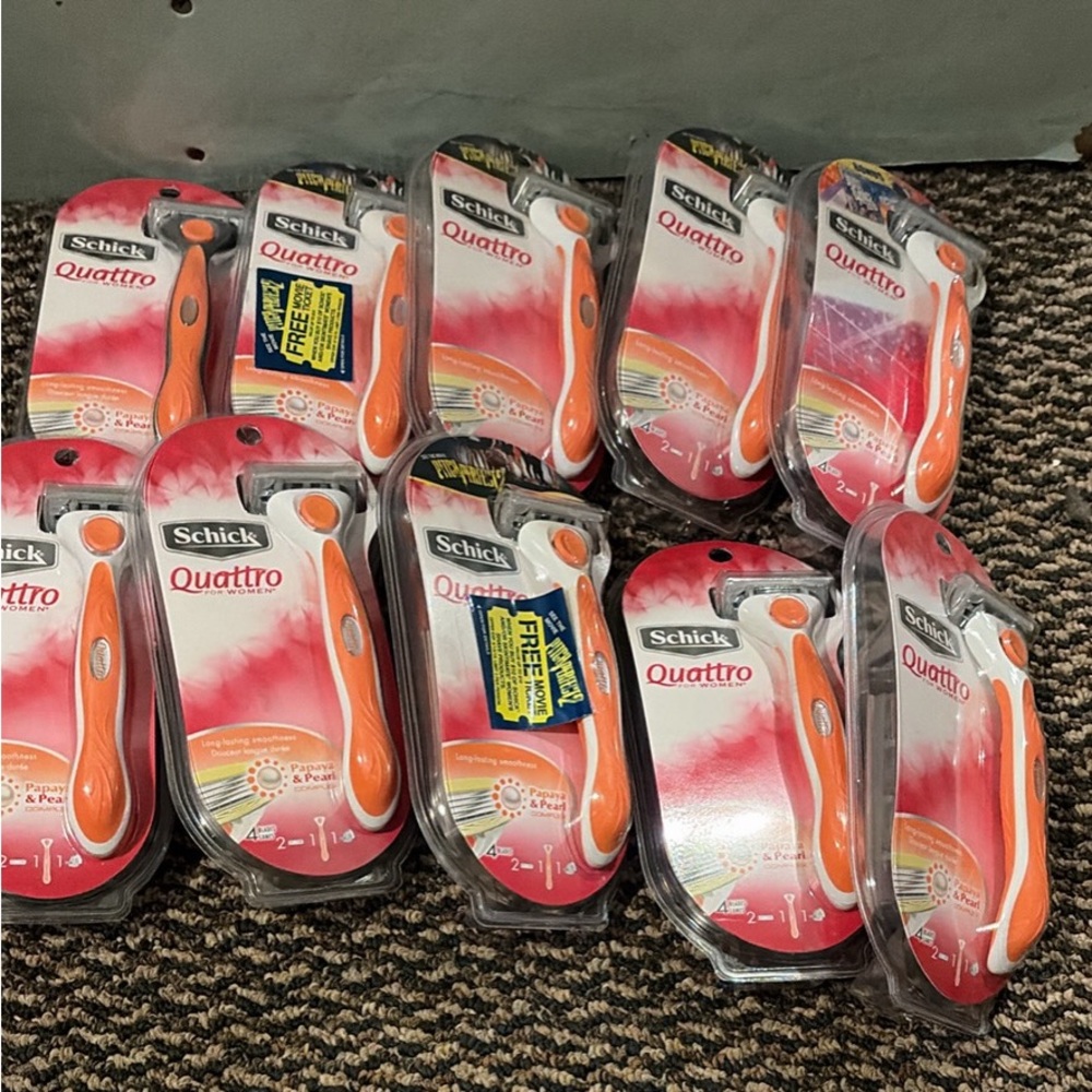 10- Schick Quattro Orange Razor
